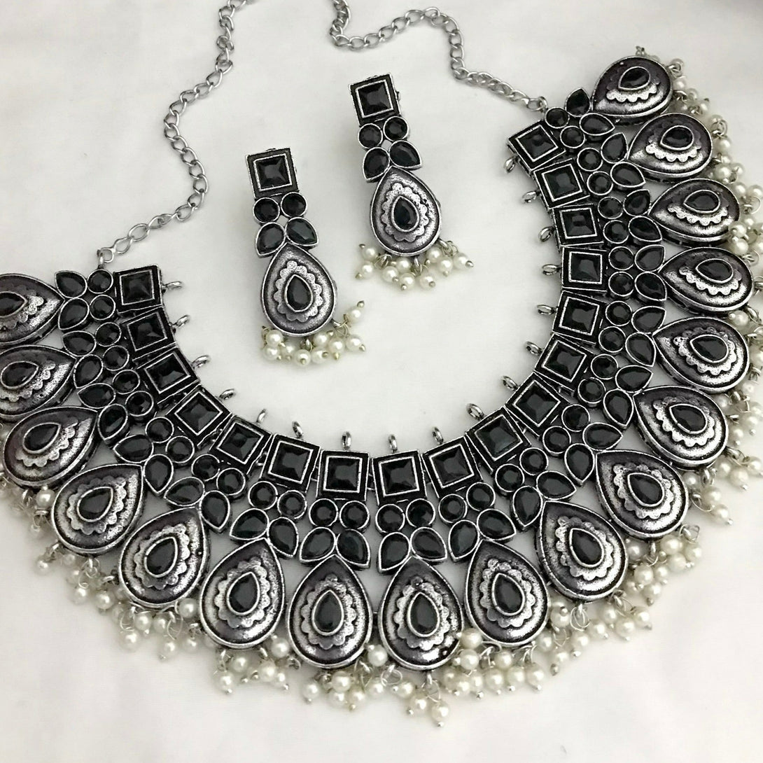 Trendy Black Tilak Shape German Silver Oxidised Necklace Set - Kanyaa