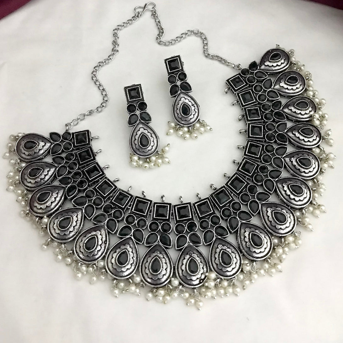 Trendy Black Tilak Shape German Silver Oxidised Necklace Set - Kanyaa