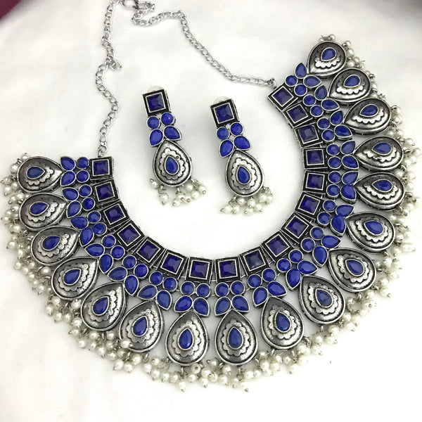 Trendy Blue Tilak Shape German Silver Oxidised Necklace Set - Kanyaa