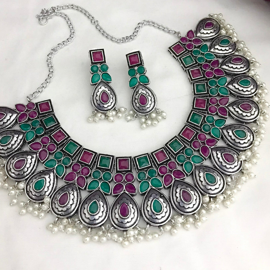 Trendy Multi Color Tilak Shape German Silver Oxidised Necklace Set - Kanyaa