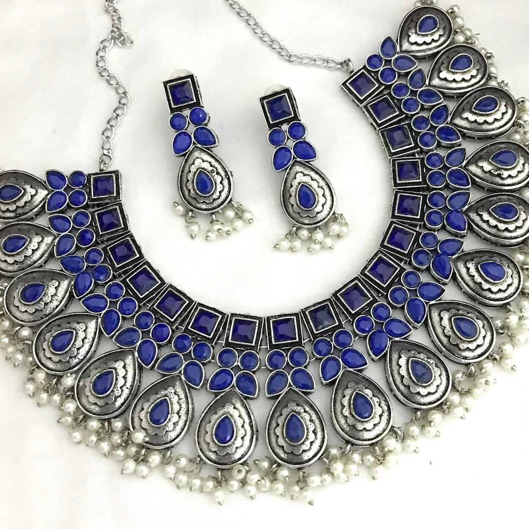 Trendy Blue Tilak Shape German Silver Oxidised Necklace Set - Kanyaa