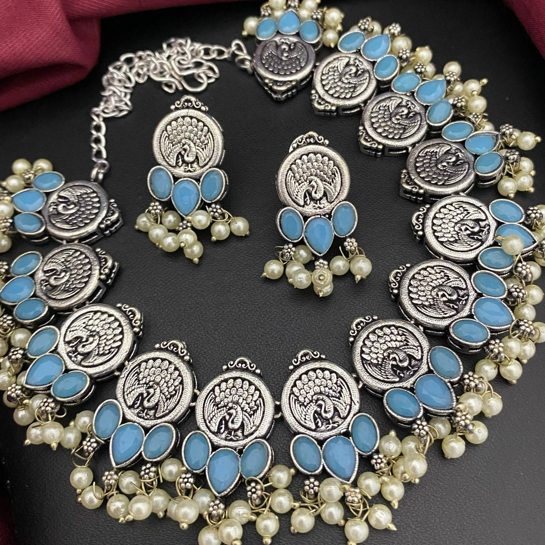 Silver Peacock Design Sky Blue Stone Oxidised Necklace Set - Kanyaa